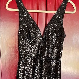 Black sequin formal dress, high slit very comfortable. Only worn once!!